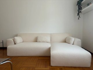 Divano angolare bianco tessuto