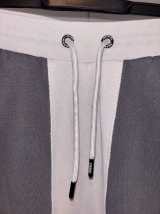 Pantalón chándal Hoodrich gris y blanco