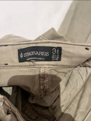 Vaqueros pitillo verdes desgastados