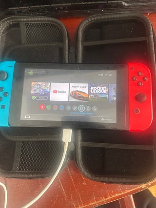 Nintendo Switch Azul y Rojo negocio y entercambio