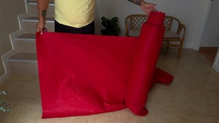 Alfombra roja de tela