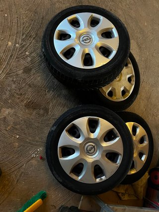 Llantas 15 con tapacubos Opel