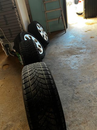 Llantas 15 con tapacubos Opel