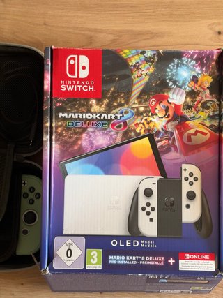 Nintendo Switch OLED + juegos