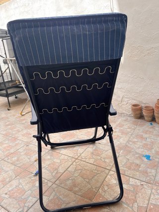 Sillón mecedora azul y negro