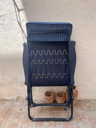 Sillón mecedora azul y negro