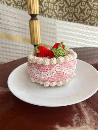 Monedero de crochet hecho a mano con fresas