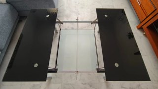 Mesa de centro elevable de cristal y acero