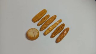 Set di 7 pezzi di pane in miniatura