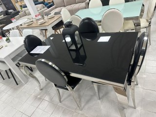 Mesa cristal negra y 4 sillas