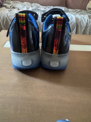 Zapatos con ruedas jiandian