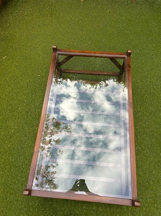Mesa de centro de madera de teca y cristal