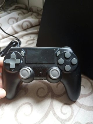 Ps4 con 2 mandos HeN/ Juegos