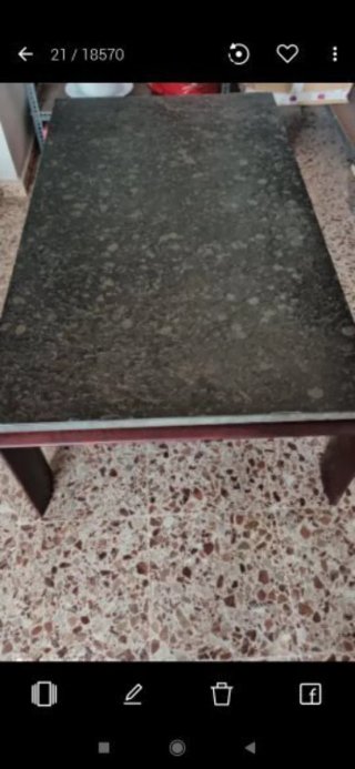 Mesa centro piedra tallada India