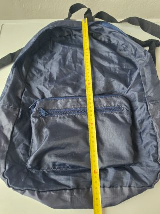 Mochila azul El Corte Inglés.