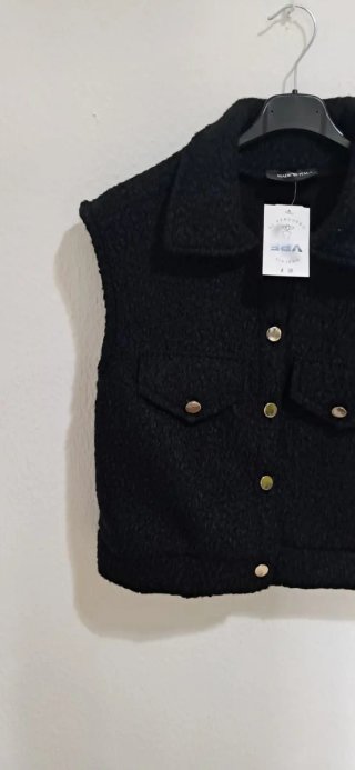Chaleco negro tejido bouclé