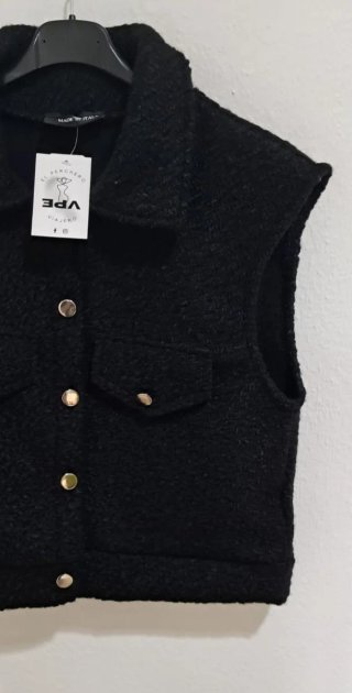 Chaleco negro tejido bouclé