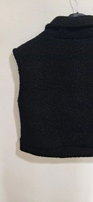 Chaleco negro tejido bouclé