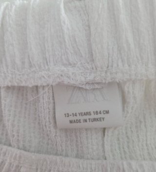 Pantalón Blanco con Cinturón niña. Talla 13-14.
