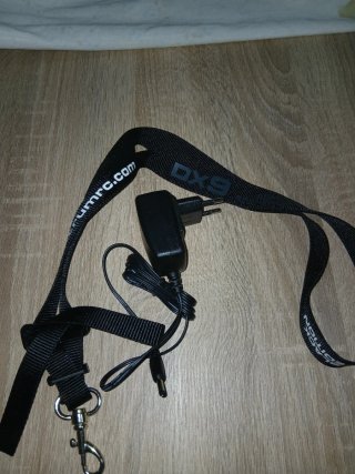 Cargador y Correa DX9