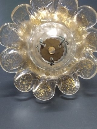 Finale in vetro trasparente e oro