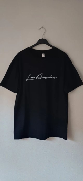 SIN ESTRENAR Camiseta negra L dibujo en la espalda