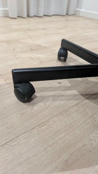 Silla IKEA Mod LOBERGET negra con cojín compañero