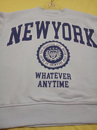 Sudadera New York azul claro Talla 11 años. Niña