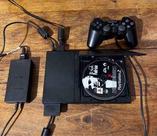 PS2 Slim Negra + Mando + Tarjeta Memoria