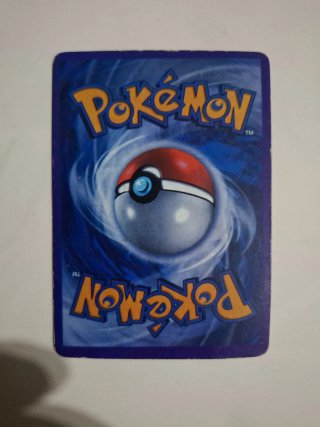 Carta Pokémon Umbreon VMAX 095/203 y Charizard V-A