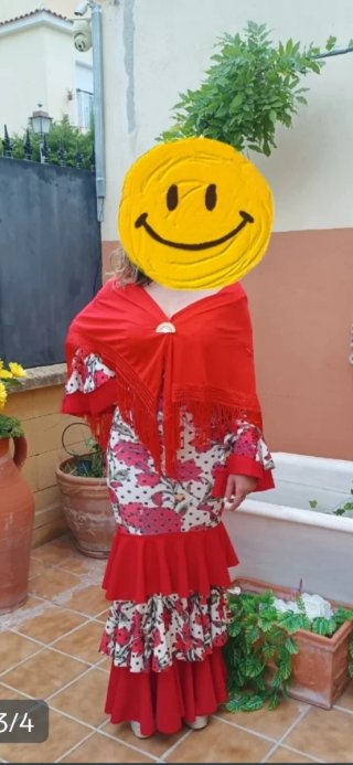 Traje de flamenca rojo con flores y lunares