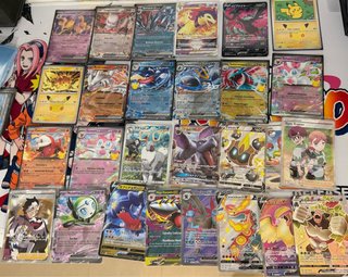 Lote de 27 Cartas Pokémon variado sin repetir