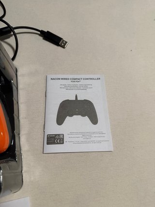Mando Nacon PS4 Compacto Naranja