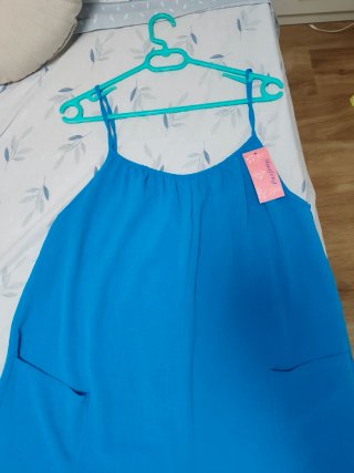 Mono turquesa con bolsillos