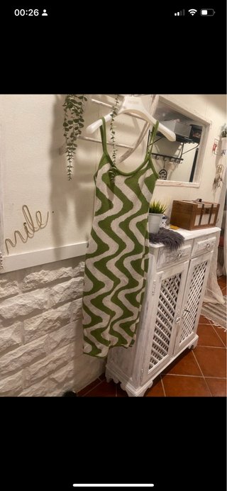 Vestido comprido estampado é Xs mas veste S