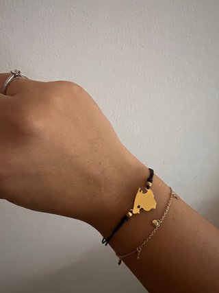 Pulsera nueva isla mallorca dorado y cordón negro