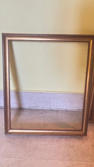 Cornice vintage dorata in legno