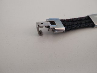 Bracciale intrecciato nero con inserti metallici