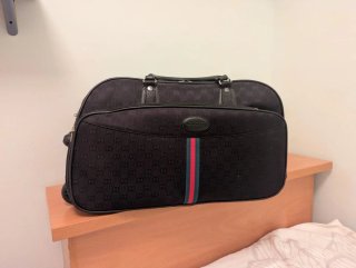 Maleta Gucci con ruedas negra multicolor