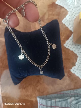 Braccialetto con ciondoli a forma di sole