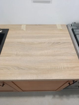 Muebles de cocina con fregadero y grifo