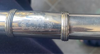 Flauta travesera cromada