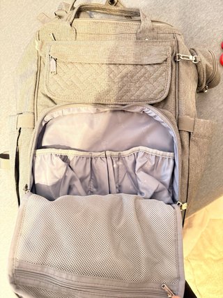 Mochila cambiador bebé gris