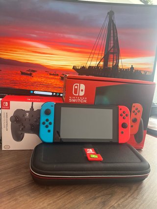 Nintendo Switch V2 Pack + Mando + Funda + SD 64 GB
