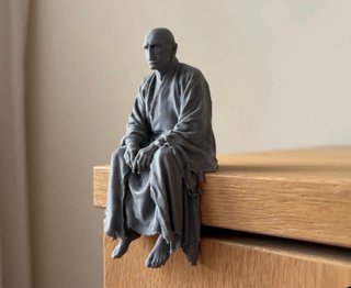 Figura de Voldemort sentado