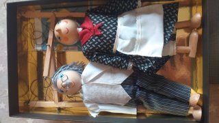Pareja de marionetas antiguas
