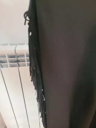 Vestido negro con flecos