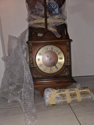 Reloj de Pared Clásico con Péndulo