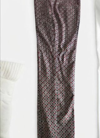 Pantalón estampado Mango negro y rojo