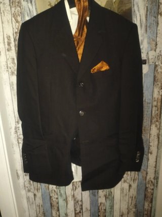 Trajes de novio negro con raya cobriza .completo